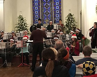 Neighbors | Alexis Bartolomucci.The Boardman High School band played Christmas music for guests during the Community Christmas event at Boardman Park on Dec. 4.