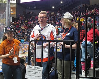 Neighbors | Alexis Bartolomucci.Morgan Crawford and Sienna Morales-Sweeney, Austintown Fitch High School seniors in Future Business Leaders of America, worked with the Youngstown Phantoms broadcasting staff to help during the game on Dec. 8.