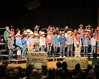 Neighbors | Alexis Bartolomucci.The first-grade class dressed up in Western style outfits for their musical performance on Dec. 20 at Poland Seminary High School.