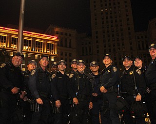 Nikos Frazier | The Vindicator..Members of the California Highway Patrol pose for a photo in Cleveland's Public Square on the fourth and final day of the Republican National Convention.