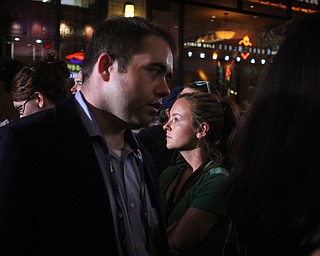 Nikos Frazier | The Vindicator..Britney Schultz of Akron watches Republic Presidential Candidate, Donald Trump accept the nomination on the fourth and final day of the Republican National Convention.