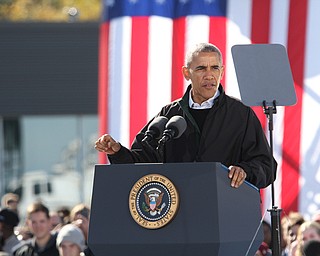 Nikos Frazier | The Vindicator..President Barack Obama speaks at a campaign rally for Democratic presidential candidate Hillary Clinton on Friday, Oct. 14, 2016 at the Cleveland Burke Lakefront Airport in Cleveland, Ohio.