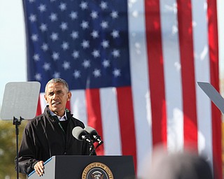Nikos Frazier | The Vindicator..President Barack Obama speaks at a campaign rally for Democratic presidential candidate Hillary Clinton on Friday, Oct. 14, 2016 at the Cleveland Burke Lakefront Airport in Cleveland, Ohio.
