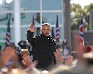 Nikos Frazier | The Vindicator..President Barack Obama speaks at a campaign rally for Democratic presidential candidate Hillary Clinton on Friday, Oct. 14, 2016 at the Cleveland Burke Lakefront Airport in Cleveland, Ohio.