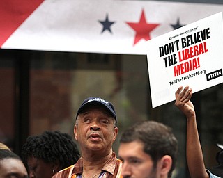 Nikos Frazier | The Vindicator..Ronnie Leeth stands outside the NBC tent in East 4th Street District of Cleveland.
