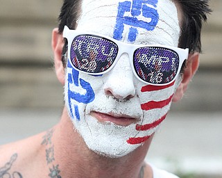 Nikos Frazier | The Vindicator..Shane Gierke of Streetsboro, Ohio poses for a photo in Cleveland's Public Square on the fourth and final day of the Republican National Convention.