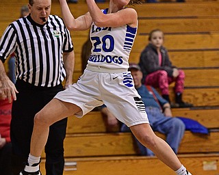 CORTLAND, OHIO - JANUARY 2017: Lindsay Carnahan #20 of Lakeview flies through the air in a unsuccessful attempt to keep the ball from going out of bounds during the first half of their game Saturday afternoon at Lakeview High School. DAVID DERMER | THE VINDICATOR