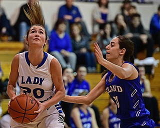 CORTLAND, OHIO - JANUARY 2017: Lindsay Carnahan #20 of Lakeview looks to the basket while being pressured by Joelle Abi Habib #30 of Poland during the first half of their game Saturday afternoon at Lakeview High School. DAVID DERMER | THE VINDICATOR