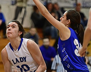 CORTLAND, OHIO - JANUARY 2017: Annie Pavlansky #10 of Lakeview goes to the basket while being guarded by Joelle Abi Habib #30 of Poland during the first half of their game Saturday afternoon at Lakeview High School. DAVID DERMER | THE VINDICATOR