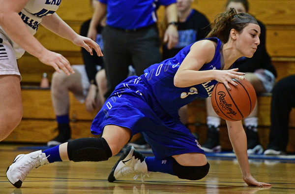 CORTLAND, OHIO - JANUARY 2017: Emily Cammack #3 of Poland falls to the court while dribbling the ball during the first half of their game Saturday afternoon at Lakeview High School. DAVID DERMER | THE VINDICATOR