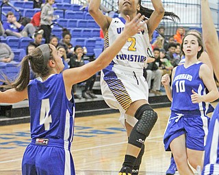 India Snyder (2) puts up a shot over Marssa Grande (4) of Hubbard during the first half of Monday nights matchup at Valley Christian School in Youngstown.   Dustin Livesay  |  The Vindicator  1/16/17  Youngstown.