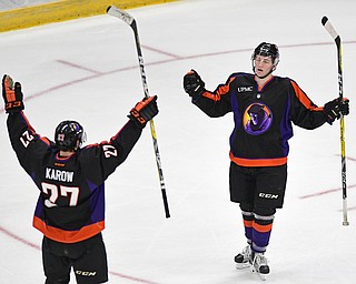 YOUNGSTOWN, OHIO - JANUARY 16, 2017: Chase Gresock #19 of the Phantoms, right, celebrates with teammate Michael Karow #27 after scoring a goal during the second period of their game Monday afternoon at the Covelli Centre. The Phantoms won 4-1. DAVID DERMER | THE VINDICATOR