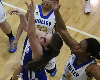 Annie DeLuco (10) of Hubbard puts up a shot after getting past the defense of Daisjha Parks (5) of Valley Christian during the second half of Monday nights matchup at Valley Christian School in Youngstown.   Dustin Livesay  |  The Vindicator  1/16/17  Youngstown.