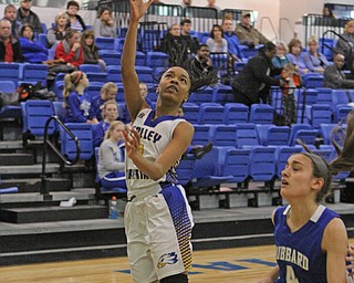 India Snyder (2) puts up a shot over Marssa Grande (4) of Hubbard during the first half of Monday nights matchup at Valley Christian School in Youngstown.   Dustin Livesay  |  The Vindicator  1/16/17  Youngstown.