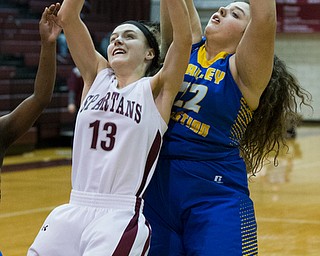 MICHAEL G TAYLOR | THE VINDICATOR- 01-18-17 -  Basketball -1st qtr, Boardman's #13 Cate Green battles for the rebound with YVC #22 Laura Sylvester. Youngstown Valley Christian Eagles vs Boardman Spartans at Boardman High School in Boardman, OH.