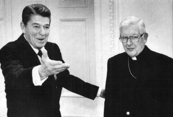 President Ronald Reagan greets Bishop James Malone, new president of the National Conference of Catholic Bishops at the While House.