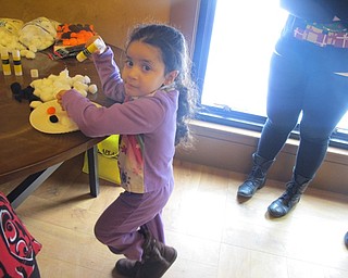 Neighbors | Alexis Bartolomucci.Ninda worked on making a snowman craft during the Polar Express day at Boardman Park on Dec. 16 hosted by the Mahoning County ESC.