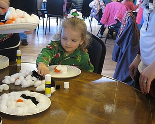Neighbors | Alexis Bartolomucci.Brooklyn made a snowman craft on Dec. 16 at the Polar Express event at Boardman Park as a holiday celebration from Mahoning Valley ESC.