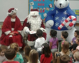 Neighbors | Submitted.Santa Claus and Mrs. Claus visited the students at North Preschool on Dec. 22 to read them stories and take pictures.