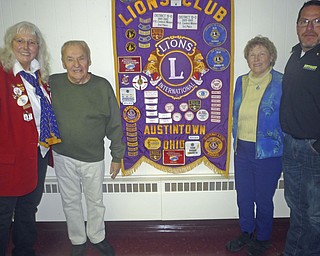 SPECIAL TO THE VINDICATOR
Austintown Lions Club hosted a meeting Jan. 9 at Austintown Community Church with John Susany presiding. Special guest, Betty Robbins of Newton Falls, governor of District 13OH-4, represents 65 Lions clubs throughout Northeast Ohio. She noted a large contribution Austintown Lions made to the Pilot Dog Complex in Columbus. Robbins presented Susany with her governor’s banner. From left are Robbins; Susany; Carol Majestic, potential member; and Mark Hart, transfer member from Girard Lions.