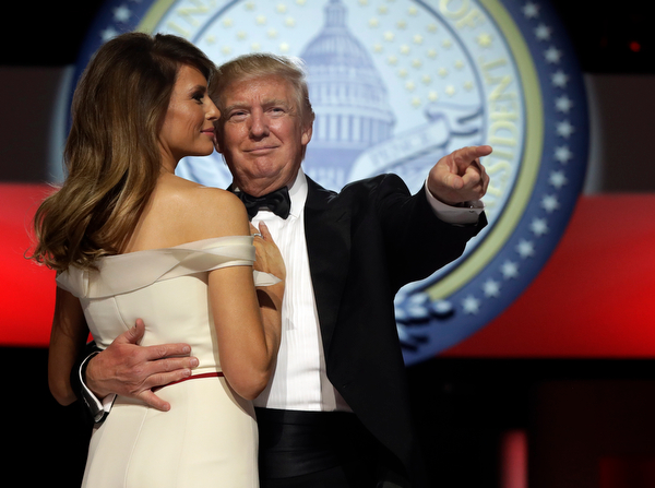 President Donald Trump dances with first lady Melania Trump at the Liberty Ball, Friday, Jan. 20, 2017, in Washington. (AP Photo/Alex Brandon)
