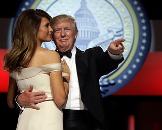 President Donald Trump dances with first lady Melania Trump at the Liberty Ball, Friday, Jan. 20, 2017, in Washington. (AP Photo/Alex Brandon)