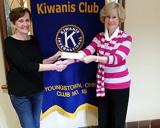 SPECIAL TO THE VINDICATOR: 
The Kiwanis Club of Youngstown donated $1,000 to the Dolly Parton Imagination Library program Jan. 13. Carla Hunter, left, Kiwanis president, presented the check to Kathy Mock, a local coordinator for the program and the director of education and initiatives for the United Way of Youngstown and the Mahoning Valley. Imagination Library sends age-appropriate books to registered children from the time they are born until the age of 5 for free. The program was founded by the actress and performer to encourage children to read. More than 1,600 communities provide Imagination Library services to more than one million children every month. For information or to register a child, call United Way at 330-746-8494.