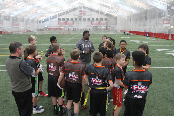 Head coach Elliot Giles talks with his players during practice at the Watson and Tressel Training Site at Youngstown State University in Youngstown on Thursday, Jan. 5, 2017. ..(Nikos Frazier | The Vindicator)..