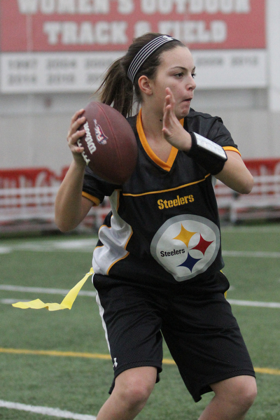 Steelers quarterback Abby Farber(13) of Poland looks for an open receiver during practice at the Watson and Tressel Training Site at Youngstown State University in Youngstown on Thursday, Jan. 5, 2017. ..(Nikos Frazier | The Vindicator)..