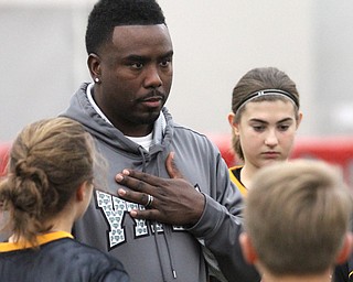 Head coach Elliot Giles talks with his players during practice at the Watson and Tressel Training Site at Youngstown State University in Youngstown on Thursday, Jan. 5, 2017. ..(Nikos Frazier | The Vindicator)..
