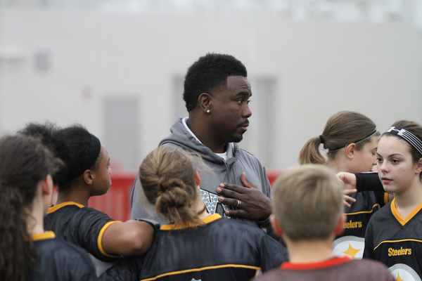 Head coach Elliot Giles talks with his players during practice at the Watson and Tressel Training Site at Youngstown State University in Youngstown on Thursday, Jan. 5, 2017. ..(Nikos Frazier | The Vindicator)..