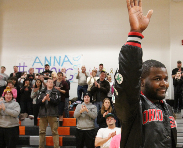 William D. Lewis The Vindicator Former OSU standout Cardale Jones waves to the crowd during a basketbnall game at Mineral Ridge Jan 23, 2017. basketball team. One of the members of McDonald Jr HS girls basketball team Anna Booth(8th grade) was recently was diagnosed with cancer. Jones visited Mondays McDonald at Mineral Ridge game to show support for Anna who didn't attend the game. Jones visited her at her McDonald home before the game.
