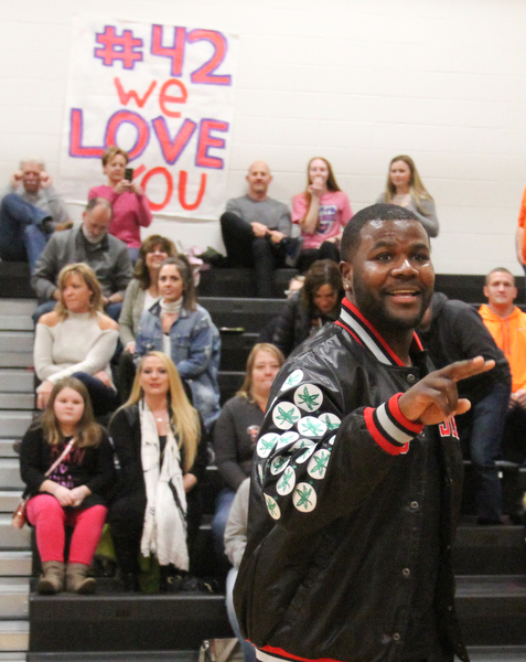 William D. Lewis The Vindicator Former OSU standout Cardale Jones waves to the crowd during a basketbnall game at Mineral Ridge Jan 23, 2017. basketball team. One of the members of McDonald Jr HS girls basketball team Anna Booth(8th grade) was recently was diagnosed with cancer. Jones visited Mondays McDonald at Mineral Ridge game to show support for Anna who didn't attend the game. Jones visited her at her McDonald home before the game. 42 is Anna's number.