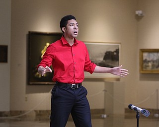        ROBERT K. YOSAY  | THE VINDICATOR..Stefon Funderburke   sings  "Hurricane" ..Vocal and visual arts collided at the Butler Institute of American Art Wednesday afternoon. YSUÕs Musical Theater program  performed at the Music at Noon presentation . Wednesday at The Butler Institute of American Art....