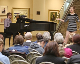        ROBERT K. YOSAY  | THE VINDICATOR..Makenzie Moorman  "I Cant say No"..Vocal and visual arts collided at the Butler Institute of American Art Wednesday afternoon. YSUÕs Musical Theater program  performed at the Music at Noon presentation . Wednesday at The Butler Institute of American Art....