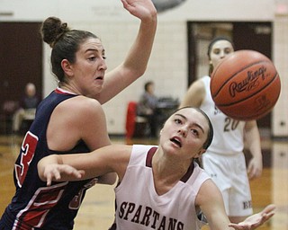 William D. Lewis The Vindicator Boardman's Jenna Vivo(5) and Fitch's Sabria Hunter(33) during Jan 25, 2017 action at Boardman.