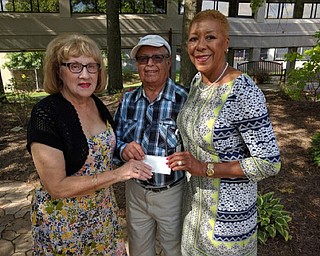 Neighbors | Submitted.Barbara Banks, Dr. Abdu and Patricia Greene posed for a photo at JLY’s annual Pink Ribbon Tea.