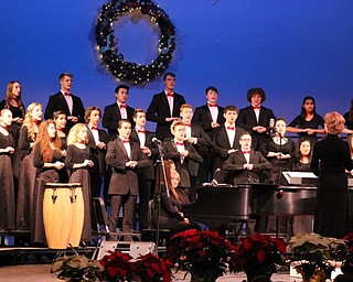 Neighbors | Abby Slanker.The Canfield Chamber Ensemble performed holiday songs, under the direction of Canfield High School Choir Director Kelly Scurich, at the Choral Music Department’s annual Winter Concert on Dec. 8.