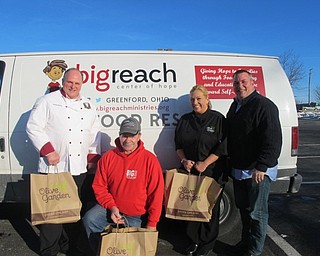 Neighbors | Alexis Bartolomucci.The Big Reach Center of Hope truck drives all around The Valley picking up donations for the Harvest Program. Pictured are, from left, Joe Bezilla, Steve Sanders, Missy Rondeau and Doug Gough.