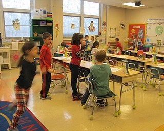 Neighbors | Alexis Bartolomucci.Students in Karen Vasco's class played a game similar to musical chairs during the last day of school before winter break on Dec. 22 at Poland Union.