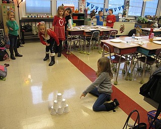 Neighbors | Alexis Bartolomucci.Students played a mini-bowling game during the last day of school before winter break on Dec. 22 at Poland Union Elementary.