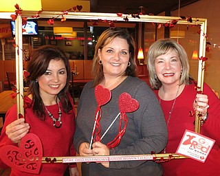 SPECIAL TO THE VINDICATOR
Members of Greater Federation of Women’s Clubs, Ohio, Austintown Junior Women’s League are participating in American Heart Association’s Wear Red Day Friday. Members recently met and reviewed healthy habits that help prevent heart disease, which causes one-in-three deaths among women every year. Above are Diana McGeary, left, Janette Neal and Linda Jones. Below are Ruty Rodriguez-Patterson and Stephanie Oyster. Information on heart disease can be found at www.heart.org and at the Facebook page AJWL 2014.