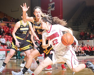 Youngstown State senior guard Jenna Hirsch(32) charges towards the net during the first quarter as the Youngstown State Penguins take on the University of Wisconsin Milwaukee Panthers at the Beeghly Center in Youngstown on Saturday, Jan. 28, 2017. The Panthers won, 78-74...(Nikos Frazier | The Vindicator)..