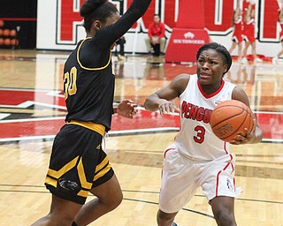 Youngstown State junior guard Indiya Benjamin(3) charges towards the net against Milwaukee senior guard Sierra Ford-Washington(30) during the second quarter as the Youngstown State Penguins take on the University of Wisconsin Milwaukee Panthers at the Beeghly Center in Youngstown on Saturday, Jan. 28, 2017. The Panthers won, 78-74...(Nikos Frazier | The Vindicator)..