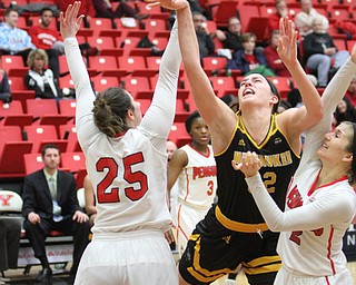 Milwaukee junior forward Steph Kostoqicz(32)(center)'s shot is blocked by Youngstown State junior forward Morgan Olson(25) and sophomore guard Alison Smolinski(2) during the fourth quarter as the Youngstown State Penguins take on the University of Wisconsin Milwaukee Panthers at the Beeghly Center in Youngstown on Saturday, Jan. 28, 2017. The Panthers won, 78-74...(Nikos Frazier | The Vindicator)..
