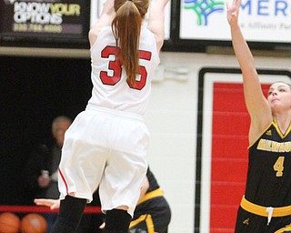 Youngstown State junior guard Kelley Wright(35) goes up for the three during the final seconds of the game as the Youngstown State Penguins take on the University of Wisconsin Milwaukee Panthers at the Beeghly Center in Youngstown on Saturday, Jan. 28, 2017. The Panthers won, 78-74...(Nikos Frazier | The Vindicator)..