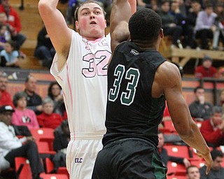 Youngstown State senior center Jorden Kaufman(32) foes up for the jump shot against Cleveland State senior forward Demonte Flannigan(33) during the first half as the Youngstown State Penguins take on the Cleveland State Vikings at the Beeghly Center in Youngstown on Saturday, Jan. 28, 2017. The Penguins won, 67-64...(Nikos Frazier | The Vindicator)..