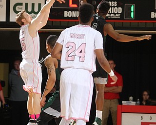 Youngstown State senior guard Brett Frantz(15) goes up for three during the first half as the Youngstown State Penguins take on the Cleveland State Vikings at the Beeghly Center in Youngstown on Saturday, Jan. 28, 2017. The Penguins won, 67-64...(Nikos Frazier | The Vindicator)..