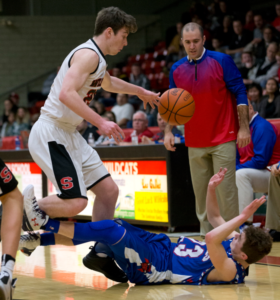 MICHAEL G TAYLOR | THE VINDICATOR- 01-28-17 -Basketball-  4th qtr., Reserve's #23 Cole DeZee causes Struther's #20 Ryan Leonard to turn over the ball.  Western Reserve Blue Devils vs Struthers Wildcats at Struthers High School in Struthers Fieldhouse, Struthers, OH..
