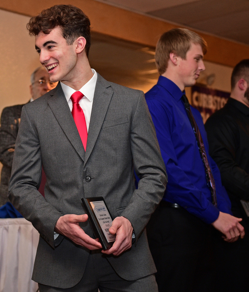 BOARDMAN, OHIO - JANUARY 29, 2017: Nick Hall of Girard smiles after finding out he won the Student Athlete of the Year Scholarship, Sunday evening at the Georgetown. DAVID DERMER | THE VINDICATOR